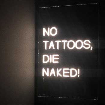 No tatoos, die naked